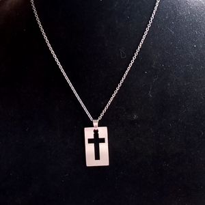 Laser cut stainless steel cut cross with necklace